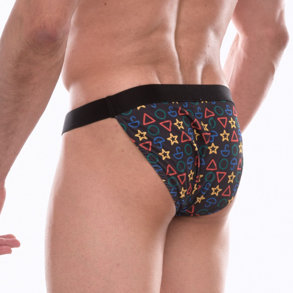 Темно-серые трусы-танга с разноцветным принтом в виде значков Темно-серые трусы-танга с разноцветным принтом в виде значков