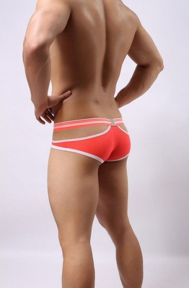 Оранжевые мужские трусы-брифы с вырезами и леопардовым рисунком Оранжевые мужские трусы-брифы с вырезами и леопардовым рисунком