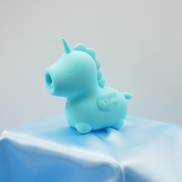 Голубой вибромассажер Unihorn Mount’n Peak с подвижным язычком Голубой вибромассажер Unihorn Mount’n Peak с подвижным язычком