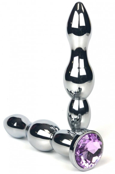 Серебристая коническая анальная пробка-ёлочка с сиреневым кристаллом - 12 см. Серебристая коническая анальная пробка-ёлочка с сиреневым кристаллом - 12 см.
