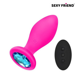 Розовая вибровтулка с голубым кристаллом и пультом ДУ - 8,5 см. Розовая вибровтулка с голубым кристаллом и пультом ДУ - 8,5 см.