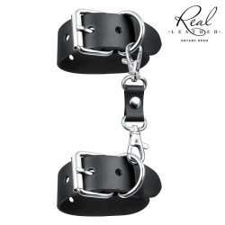 Черные кожаные наручники на застежках Черные кожаные наручники на застежках